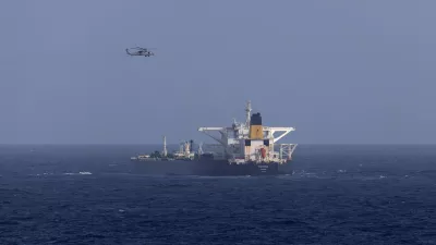 A U.S. military helicopter flies over the Panama-flagged Centuries, which was intercepted by the U.S. Coast Guard, days after U.S. President Donald Trump announced a "blockade" of all sanctioned oil tankers entering and leaving Venezuela, east of Barbados in the Caribbean Sea December 20, 2025. DHS/Handout via REUTERS  THIS IMAGE HAS BEEN SUPPLIED BY A THIRD PARTY