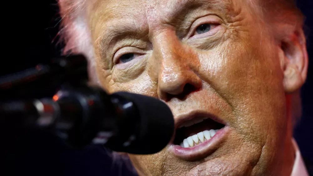 FILE PHOTO: U.S. President Donald Trump addresses House Republicans at their annual issues conference retreat, at the Kennedy Center, renamed the Trump-Kennedy Center by the Trump-appointed board of directors, in Washington, D.C., U.S., January 6, 2026. REUTERS/Kevin Lamarque/File Photo