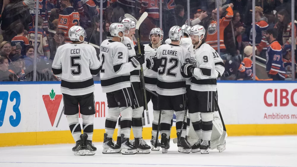 Los Angeles Kings players celebrate the win over the Edmonton Oilers during a shoot-out of an NHL hockey game in Edmonton on Saturday, Jan. 10, 2026. (Jason Franson/The Canadian Press via AP)