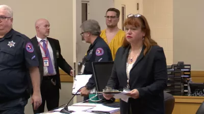 This image taken from video shows Michael David McKee walking into the courtroom on Monday, January 12, 2026, in Rockford, Ill. (WIFR News/Pool Photo via AP)