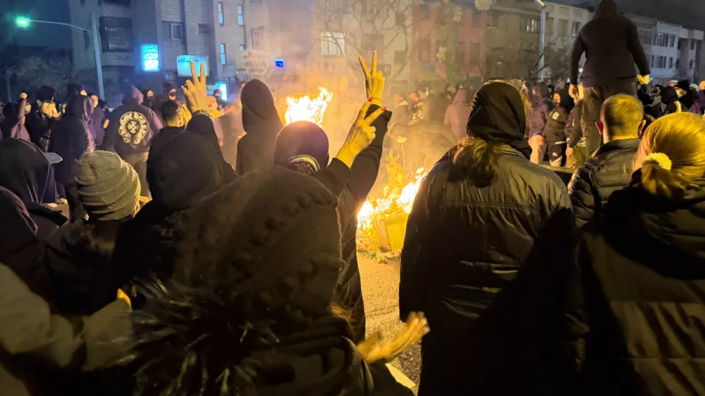 Iranians attend an anti-government protest in Tehran, Iran, Friday, Jan. 9, 2026. (AP Photo)
