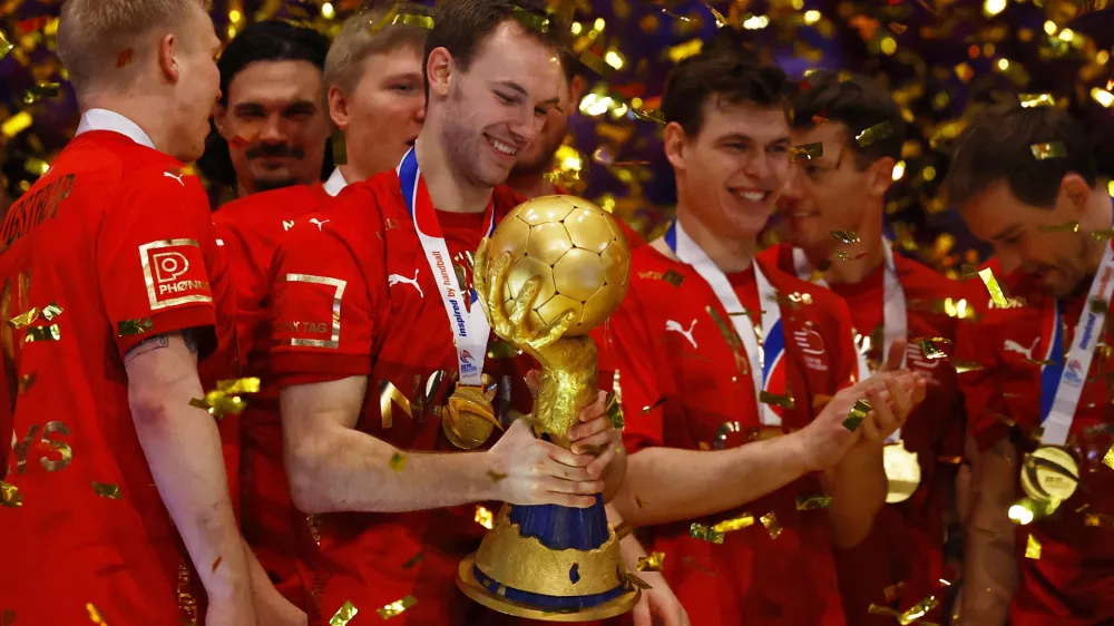 Handball - IHF Handball World Championships 2025 - Final - Croatia v Denmark - Unity Arena, Oslo, Norway - February 2, 2025 Denmark's Mathias Gidsel with teammates celebrate with the trophy after winning the IHF 2025 Men's Handball Championship REUTERS/Susana Vera