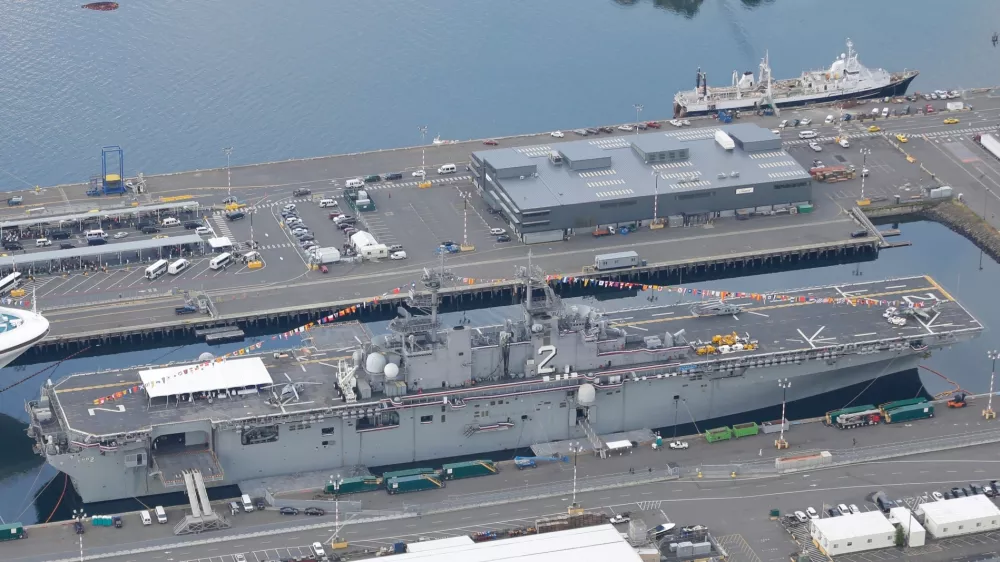 FILE -In this aerial photo taken Aug. 2, 2014, the U.S. Navy USS Essex is shown docked near downtown Seattle during the annual Seafair summer festival. (AP Photo/Ted S. Warren, File)
