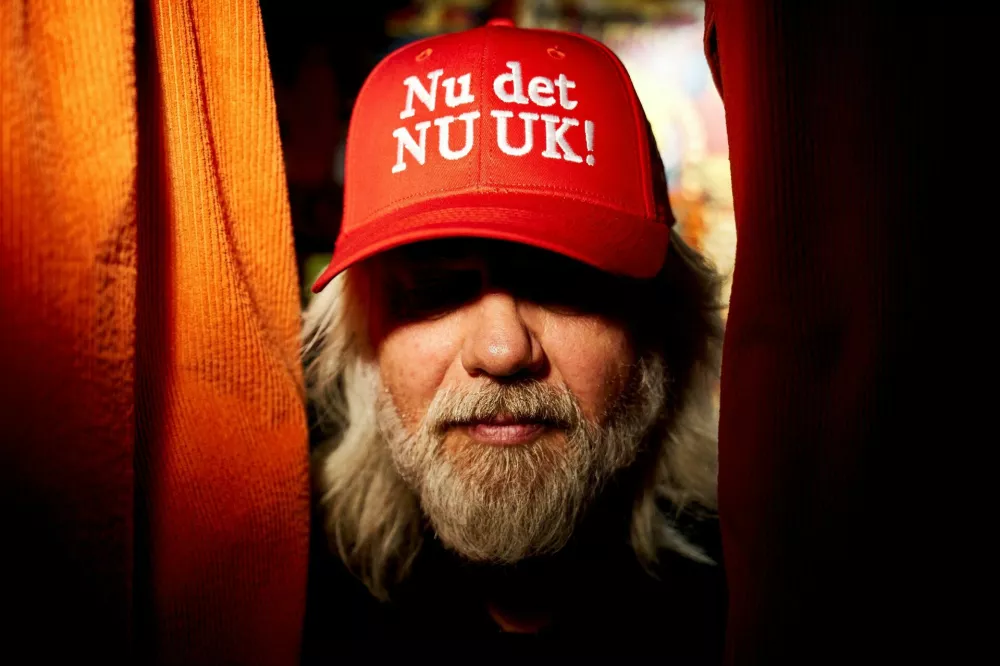 Jesper Toennesen, the creator of the Anti-MAGA cap "Nu det NUUK!" which is sold in his clothing store McKorman on Noerrebrogade, looks on, in Copenhagen, Denmark, January 13, 2026. The message "Nu er det NUUK!" and "Make America go away" is embroidered on the cap. After the heated debate between the U.S., Greenland, and Denmark about Trump's renewed desire to take over Greenland, "Nu er det NUUK" has gone viral on the internet. The phrase "Nu er det NUUK!" refers to Greenland's capital Nuuk - and can be translated from Danish as "Enough is enough". Thomas Traasdahl/Ritzau Scanpix/via REUTERS  ATTENTION EDITORS - THIS IMAGE WAS PROVIDED BY A THIRD PARTY. DENMARK OUT. NO COMMERCIAL OR EDITORIAL SALES IN DENMARK.