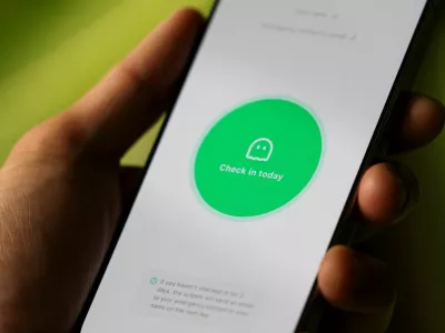 "Are you dead" app, or "Demumu" in its english version, a Chinese safety tool designed for people living alone, on a mobile phone in this illustration picture taken January 14, 2026. REUTERS/Tingshu Wang/Illustration