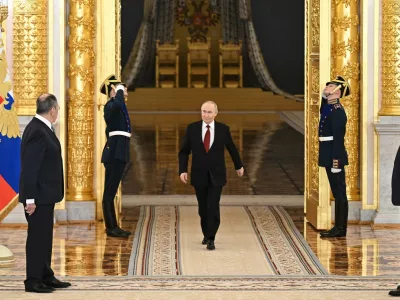 HANDOUT - 15 January 2026, Russia, Moscow: Russian President Vladimir Putin arrives to the ceremony to receive the credentials of newly appointed Ambassadors to Russia. Photo: Sergey Bobylev/Kremlin/dpa - ATTENTION: editorial use only and only if the credit mentioned above is referenced in full