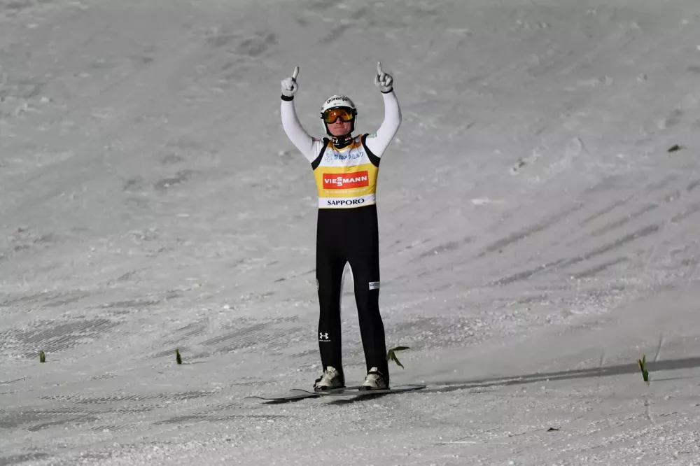 Ski Jumping - Ski Jumping World Cup - Sapporo, Japan - January 17, 2026 Slovenia's Domen Prevc celebrates after winning the men's large hill REUTERS/Issei Kato