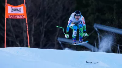 Slovenia's Ilka Stuhec speeds down the course during an alpine ski, women's World Cup downhill training, in Tarvisio, Italy, Friday Jan. 16, 2026. (AP Photo/Giovanni Auletta)