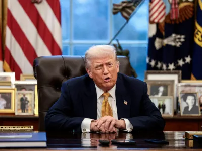 FILE PHOTO: U.S. President Donald Trump is interviewed by Reuters White House correspondent Steve Holland (not pictured) during an exclusive interview in the Oval Office in the White House in Washington, D.C., U.S., January 14, 2026. REUTERS/Evelyn Hockstein/File Photo