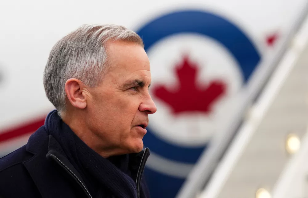 Prime Minister Mark Carney arrives in Zurich, Switzerland on Monday, Jan. 19, 2026, to attend the World Economic Forum in Davos. (Sean Kilpatrick/The Canadian Press via AP)