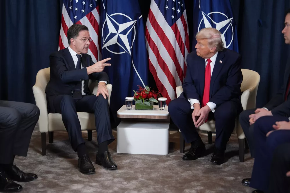 President Donald Trump, right, meets with NATO Secretary General Mark Rutte during a meeting on the sidelines of the Annual Meeting of the World Economic Forum in Davos, Switzerland, Wednesday, Jan. 21, 2026. (AP Photo/Evan Vucci)
