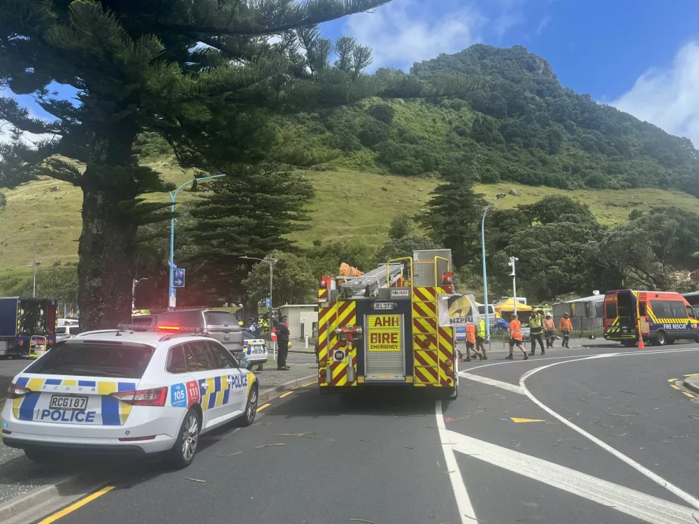 Emergency services personnel work at the site of a landslide triggered by heavy rains, at a campsite in Mount Maunganui, New Zealand January 22, 2026. New Zealand Police/Handout via REUTERS  THIS IMAGE HAS BEEN SUPPLIED BY A THIRD PARTY. NO RESALES. NO ARCHIVES. MANDATORY CREDIT.