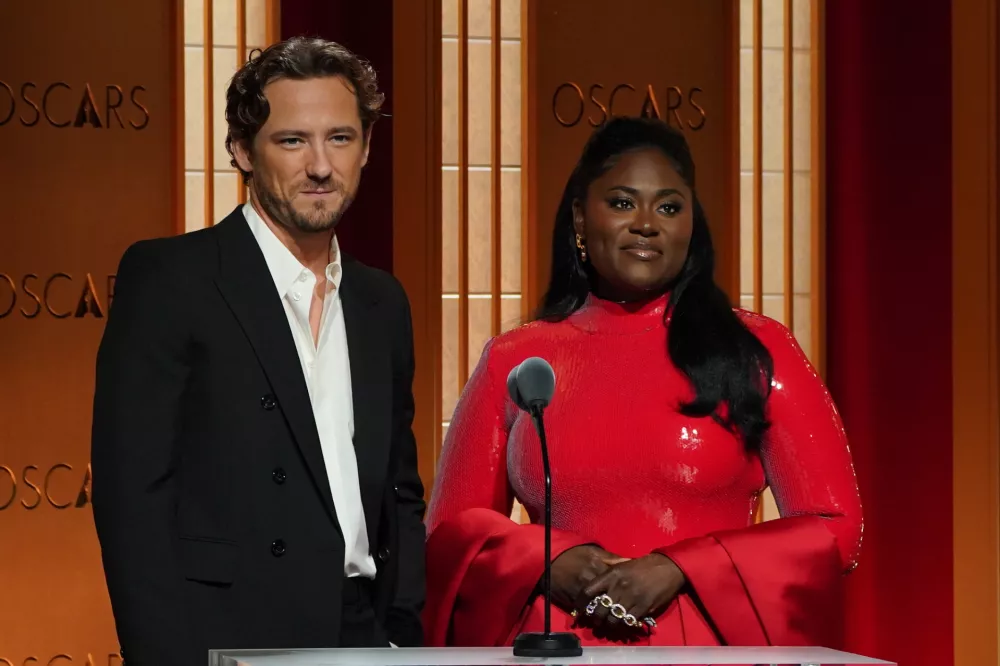 Lewis Pullman, left, and Danielle Brooks present the nominees for the 98th Academy Awards on Thursday, Jan. 22, 2026, at the Samuel Goldwyn Theater in Beverly Hills, Calif. (Photo by Jordan Strauss/Invision/AP)