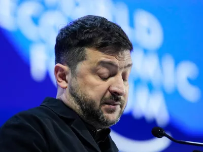 Ukraine's President Volodymyr Zelenskyy delivers a speech at the Annual Meeting of the World Economic Forum in Davos, Switzerland, Thursday, Jan. 22, 2026. (AP Photo/Markus Schreiber)