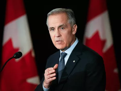 Canada's Prime Minister Mark Carney speaks during a news conference before a cabinet planning forum at the Citadelle in Quebec City, Quebec, Canada January 22, 2026. REUTERS/Mathieu Belanger