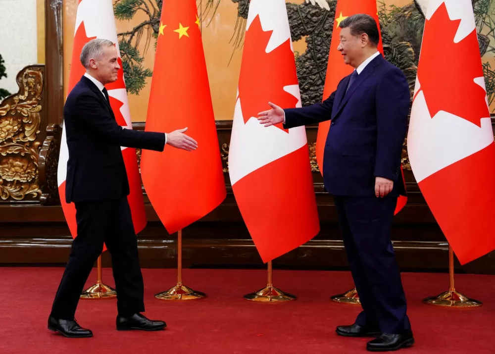 Canadian Prime Minister Mark Carney meets with President of China Xi Jinping at the Great Hall of the People in Beijing, China on Friday, Jan. 16, 2026. Sean Kilpatrick/Pool via REUTERS   TPX IMAGES OF THE DAY