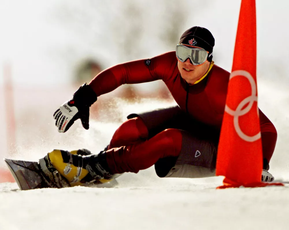 FILE PHOTO: Ryan Wedding of Canada takes a practice run for the men's parallel giant slalom of the Salt Lake 2002 Winter Olympic Games in Park City, February 13, 2002. Competition in the men's parallel giant slalom begins February 14, 2002. REUTERS/Jeff J Mitchell/File Photo