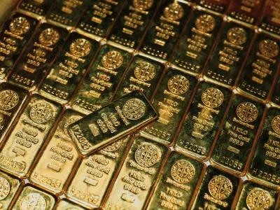File photo dated March 13, 2001 of Gold bars in Switzerland. Gold prices have soared to a record high, with investors rushing to find safe places to park their money as concerns grow about a resurgence in the coronavirus and the impact that could have on the global economy.,Image: 548000153, License: Rights-managed, Restrictions:, Model Release: no