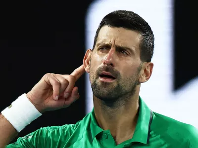 Tennis - Australian Open - Melbourne Park, Melbourne, Australia - January 24, 2026 Serbia's Novak Djokovic celebrates and gestures to crowd after winning his third round match against Netherlands' Botic van de Zandschulp REUTERS/Tingshu Wang   TPX IMAGES OF THE DAY