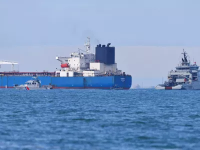 French navy boats surround the GRINCH oil tanker, intercepted by France in the Alboran Sea on suspicion of operating under a false flag and belonging to Russia's shadow fleet that enables Russia to export oil despite sanctions, and diverted to the port of Marseille-Fos, in the Gulf of Fos-sur-Mer, in Martigues, France, January 25, 2026. REUTERS/Manon Cruz