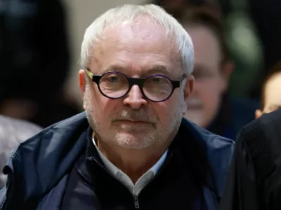 Former French Senator Joel Guerriau arrives with his lawyer Henri Carpentier for a hearing in his trial for allegedly spiking member of parliament Sandrine Josso's drink with the intention of sexually assaulting her, at the courthouse in Paris, France, January 26, 2026. REUTERS/Stephanie Lecocq