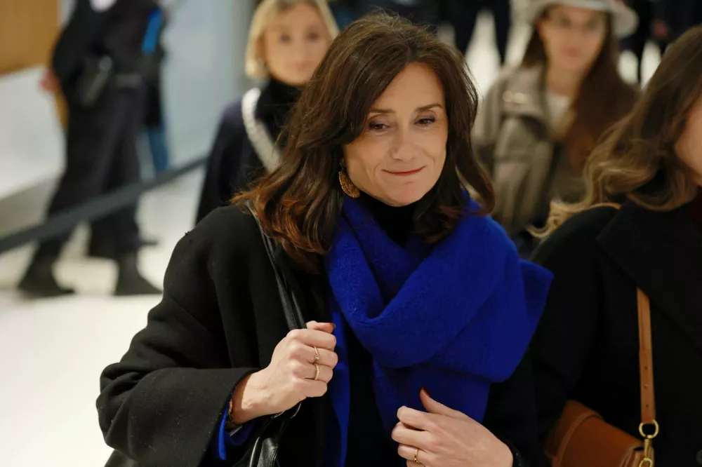 French member of parliament Sandrine Josso arrives for the trial of former French Senator Joel Guerriau for allegedly spiking her drink with the intention of sexually assaulting her, at the courthouse in Paris, France, January 26, 2026. REUTERS/Stephanie Lecocq