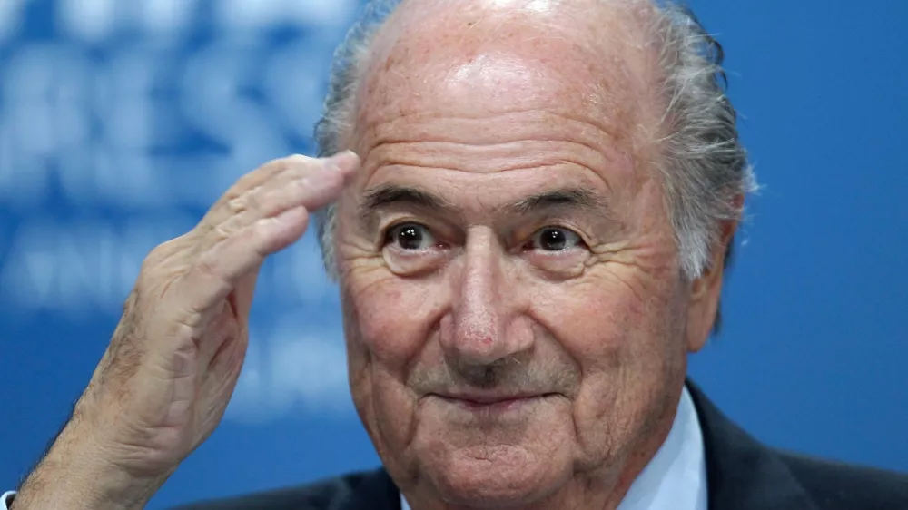 FILE - In this June 1, 2011, file photo, Sepp Blatter gestures during a press conference in Zurich, Switzerland. (AP Photo/Michael Probst, File)