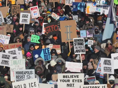 FILE - EDS NOTE: OBSCENITY - People protest against ICE (Immigration and Customs Enforcement) in downtown Minneapolis, Sunday, Jan. 25, 2026. (AP Photo/Adam Gray, File)