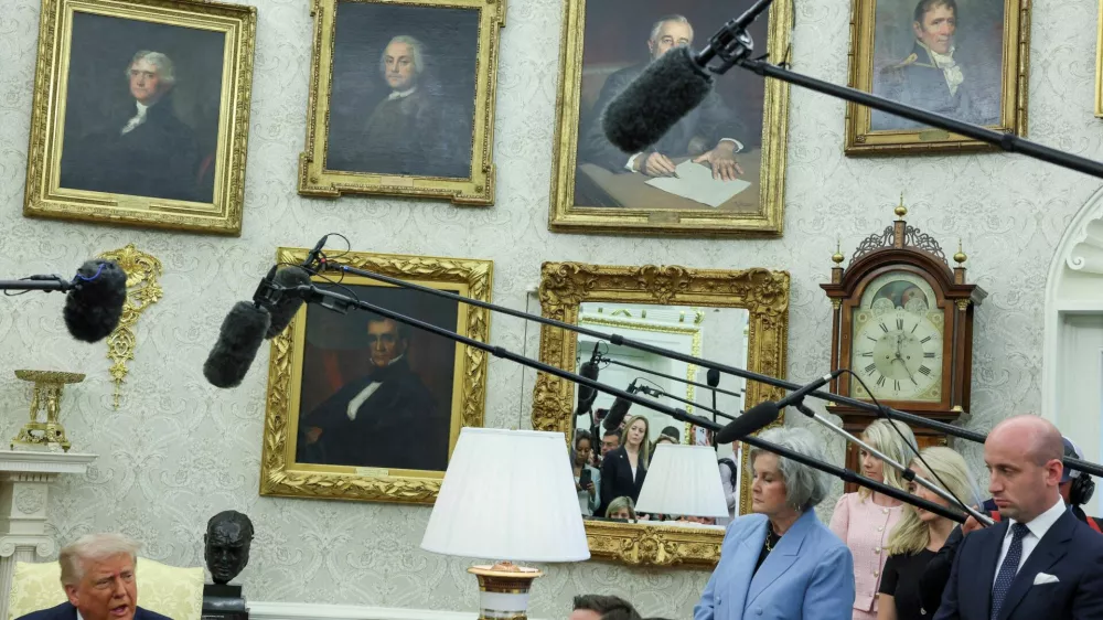 FILE PHOTO: U.S. Vice President JD Vance, U.S. White House Chief of Staff Susie Wiles, and U.S. White House deputy chief of staff Stephen Miller listen as U.S. President Donald Trump speaks during a meeting with Canadian Prime Minister Mark Carney (not pictured) in the Oval Office at the White House in Washington, D.C., U.S., May 6, 2025. REUTERS/Leah Millis/File Photo