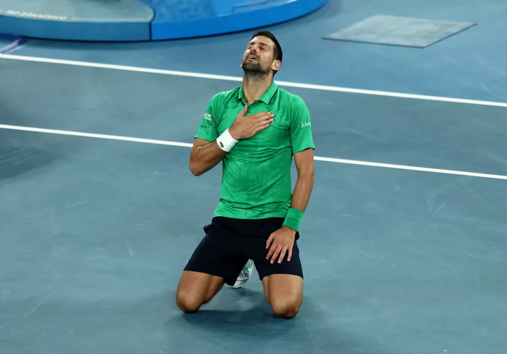 Tennis - Australian Open - Melbourne Park, Melbourne, Australia - January 31, 2026 Serbia's Novak Djokovic celebrates winning his semi final match against Italy's Jannik Sinner REUTERS/Tingshu Wang