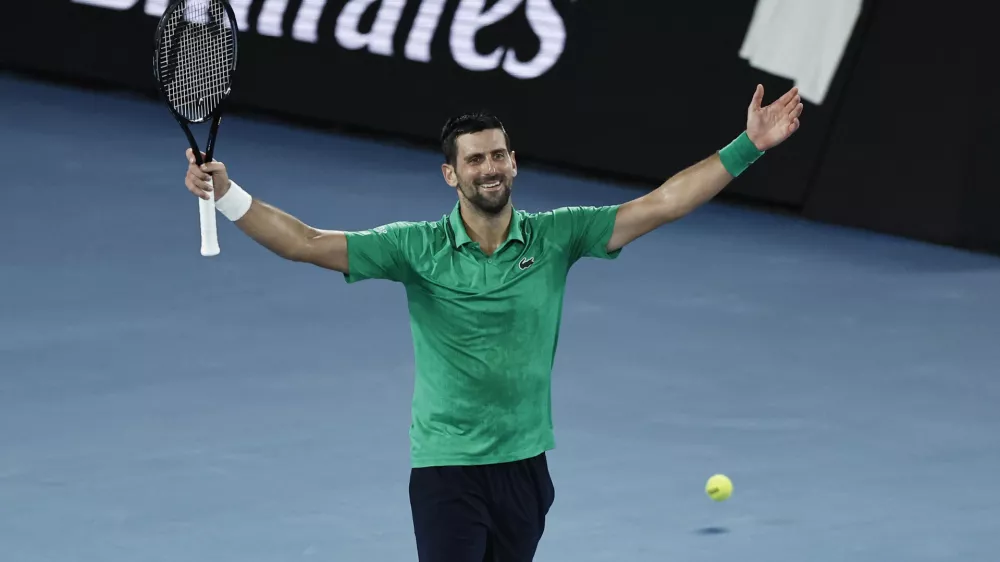 Tennis - Australian Open - Melbourne Park, Melbourne, Australia - January 31, 2026 Serbia's Novak Djokovic celebrates winning his semi final match against Italy's Jannik Sinner REUTERS/Tingshu Wang