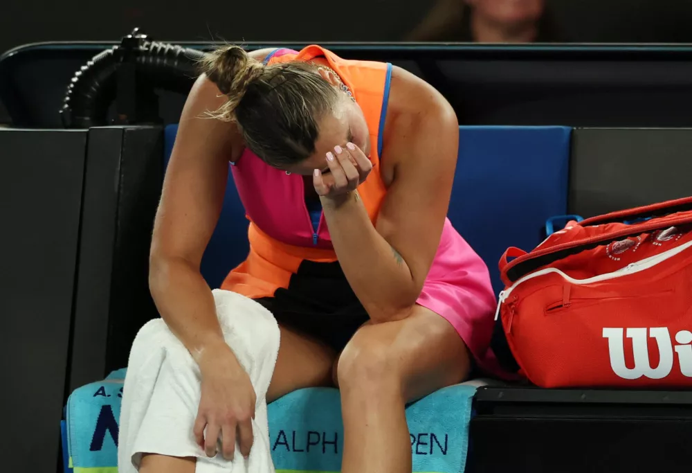 Tennis - Australian Open - Melbourne Park, Melbourne, Australia - January 31, 2026 Belarus' Aryna Sabalenka looks dejected after losing the women's singles final against Kazakhstan's Elena Rybakina REUTERS/Hollie Adams