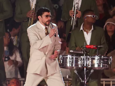 FILE PHOTO: Puerto Rican singer Bad Bunny performs during a concert of his "DeBi TiRAR MaS FOToS World Tour" in Mexico City, Mexico, December 10, 2025. REUTERS/Henry Romero/File Photo