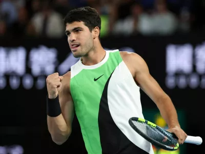 Tennis - Australian Open - Melbourne Park, Melbourne, Australia - February 1, 2026 Spain's Carlos Alcaraz reacts during the men's singles final against Serbia's Novak Djokovic REUTERS/Edgar Su