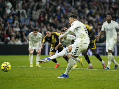 Soccer Football - LaLiga - Real Madrid v Rayo Vallecano - Santiago Bernabeu, Madrid, Spain - February 1, 2026 Real Madrid's Kylian Mbappe scores their second goal from the penalty spot REUTERS/Ana Beltran