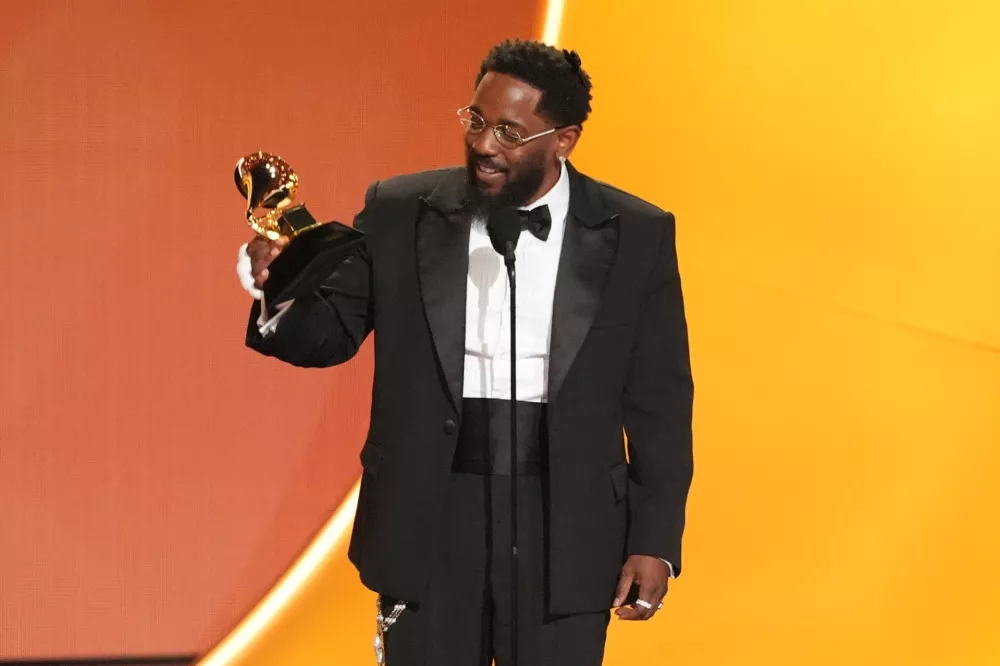 Kendrick Lamar accepts the award for best rap album for "GNX" during the 68th annual Grammy Awards on Sunday, Feb. 1, 2026, in Los Angeles. (AP Photo/Chris Pizzello)