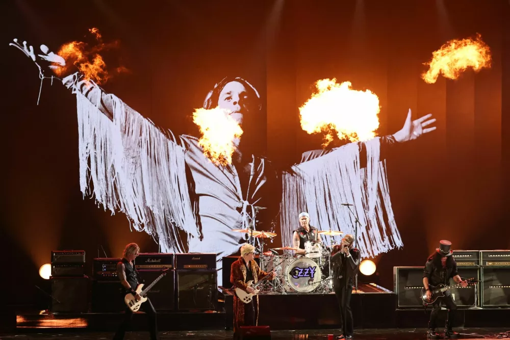 Musicians Slash, Alex Watt and Post Malone perform an Ozzy Osbourne Tribute at the 68th Annual Grammy Awards in Los Angeles, California, U.S., February 1, 2026. REUTERS/Daniel Cole