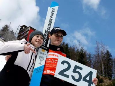 FILE PHOTO: Ski Jumping - FIS Ski Jumping World Cup - Planica, Slovenia - March 30, 2025 Slovenia's Domen Prevc poses with his sister Nika Prevc after setting a new world record in the Men's Individual HS240 Second Round REUTERS/Borut Zivulovic/File Photo