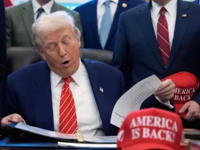 President Donald Trump speaks in the Oval Office of the White House, Tuesday, Feb. 3, 2026, in Washington, before signing a spending bill that will end a partial shutdown of the federal government. (AP Photo/Alex Brandon)