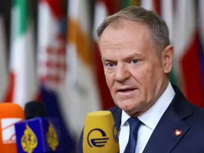 FILE PHOTO: Polish Prime Minister Donald Tusk speaks to the media at a European Union leaders' summit in Brussels, Belgium, December 18, 2025. REUTERS/Yves Herman/File Photo