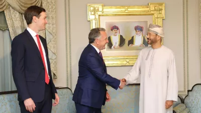In this photo released by the Oman's Foreign Ministry, Steve Witkoff, White House special envoy, centre, shakes hands with Oman's Foreign Minister Sayyid Badr Albusaidi as Jared Kushner, left, looks on during their meeting prior to Iran and the U.S. negotiations, in Muscat, Oman, Friday, Feb. 6, 2026. (Oman Foreign Ministry via AP)