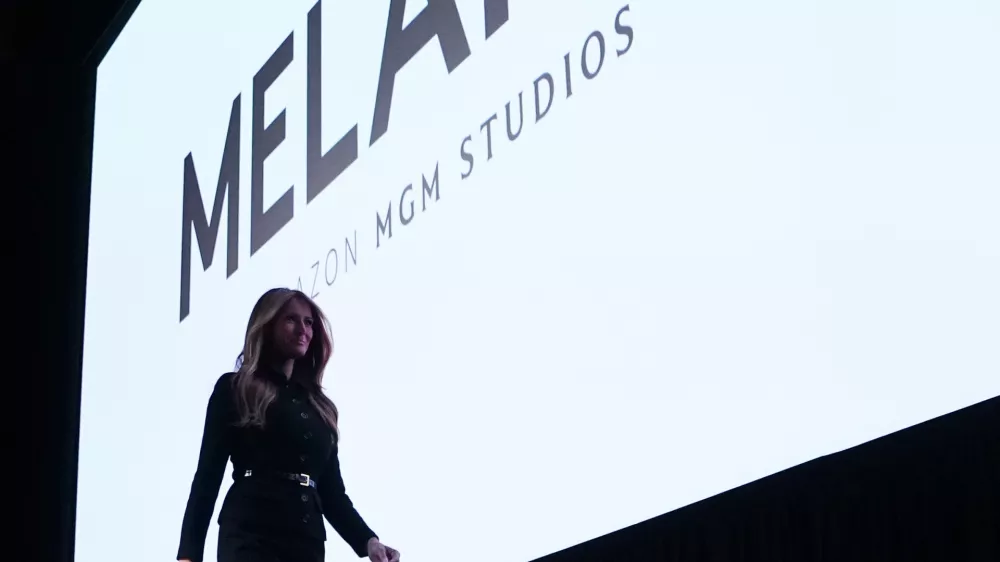 FILE - First lady Melania Trump exits the stage after speaking before the premiere of her movie "Melania" at The John F. Kennedy Memorial Center for the Performing Arts in Washington, Jan. 29, 2026. (AP Photo/Allison Robbert, File)