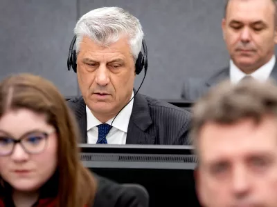 FILE - Former Kosovo president Hashim Thaci, left, appears before the Kosovo Tribunal in the Hague, on April 3, 2023. (Koen van Weel/Pool Photo via AP, File)