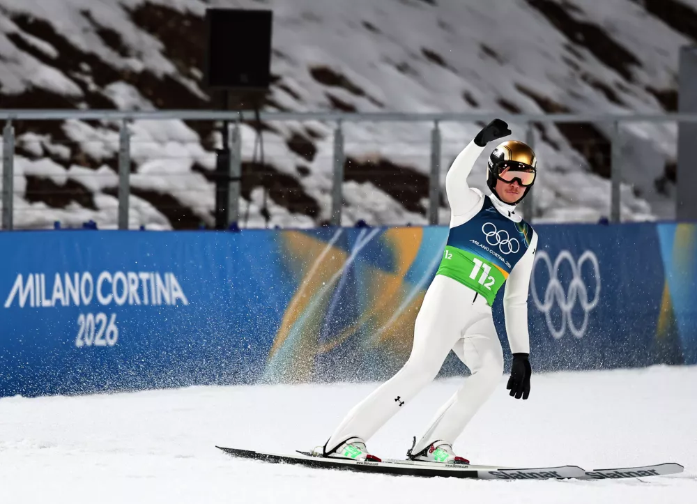 10 February 2026, Italy, Predazzo: Slovenia's Anze Lanisek reacts after the Ski Jumping Mixed team final round competition of the 2026 Winter Olympic Games at Milan-Cortina. Photo: Daniel Karmann/dpa