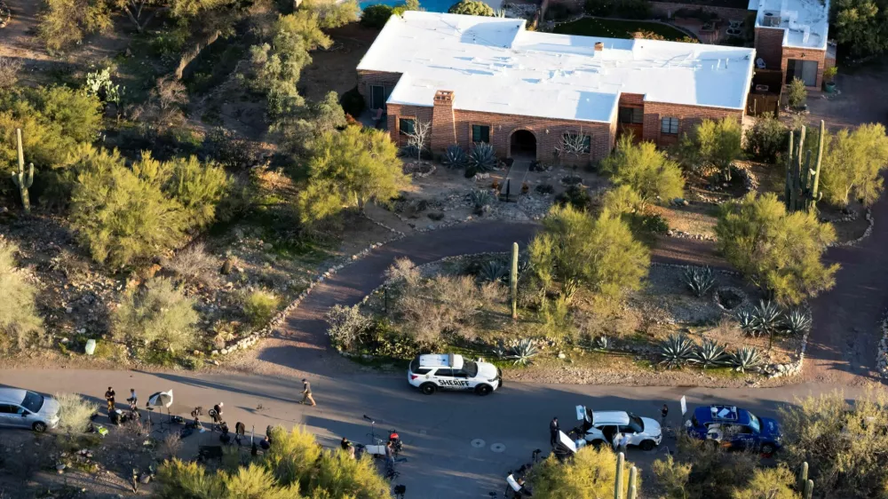 A drone view shows media staging near the home of Nancy Guthrie, the 84-year-old mother of U.S. journalist and television host Savannah Guthrie, who went missing from her home in Tucson, U.S. February 9, 2026. REUTERS/Rebecca Noble