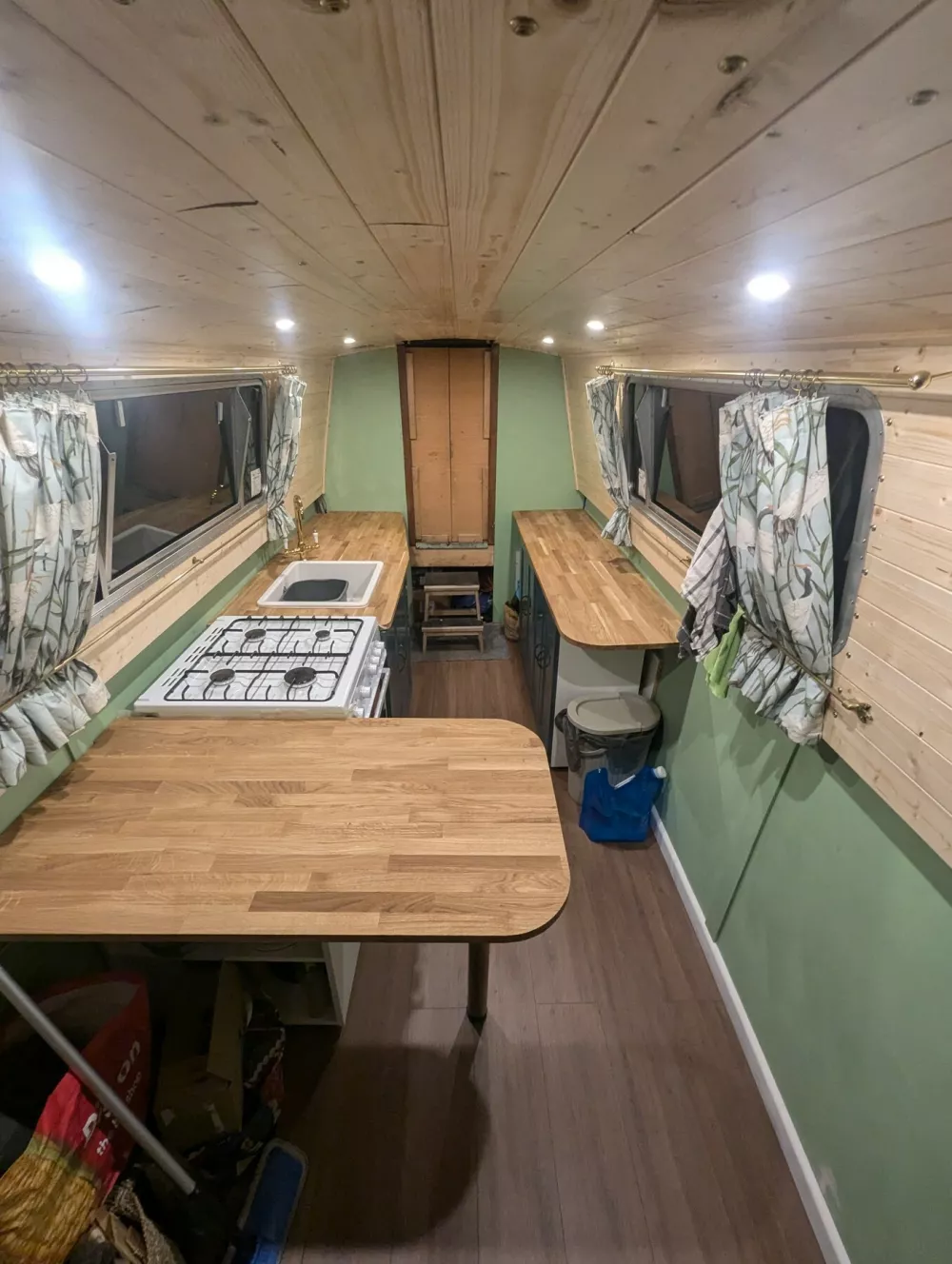 EXCLUSIVE: Story from Jam Press (Downsizing To Narrowboat) Pictured: Video grab - Inside Eleanor Sutcliffe's 50ft narrowboat during an updated tour of her floating home.VIDEO: 'I bought Ł15,000 50ft narrowboat to call home after relationship ended &ndash; it's the best decision I've ever made'A woman who lives aboard a tiny narrowboat says she took the "ultimate leap of faith" by buying it &ndash; and it's paid off.Eleanor Sutcliffe was dealing with the end of a relationship, and had moved out of the home she'd shared with her ex, when she came across the boat on sale via Facebook Marketplace.During the sale of her house, the 28-year-old says she couldn't afford another home in the area where she works."I needed to think outside the box, and I'd always wanted to live on a narrowboat," Eleanor, who is originally from North Wales but now lives in the Birmingham area, told What's The Jam."My parents have always supported any weird ideas I've had, and my dad said he would help me renovate one if we needed to."Neither of us had ever been on a boat before, but he is great at DIY and I've always been quite practical and love to learn new skills."Eleanor, a firefighter, said she is making savings by living on her boat compared to buying or renting a home in Birmingham.She added: "I find the cost is much better &ndash; my overall boat costs including mooring fee, license, insurance and fuel come to just under Ł500 a month."For context, to rent a flat near to where I work, I would be looking at around Ł750 or more for rent alone."Eleanor bought her 50ft-long 1986 Dartline boat in May 2024 for Ł15,000 and then took out a loan to complete the renovation works.She added: "I fell in love with my boat the first time I saw her."She was a bit of a mess, but I loved the thought of trying to restore her back to her former glory."Although the boat needed a full revamp, Eleanor moved in around October 2024, as her house had sold.She said: "I lived in it while we were still building.16 Jan 2026Pictured: Story from Jam Press (Downsizing To Narrowboat) Pictured: The finished galley kitchen inside the renovated 50ft narrowboat.VIDEO: 'I bought Ł15,000 50ft narrowboat to call home after relationship ended &ndash; it's the best decision I've ever made'A woman who lives aboard a tiny narrowboat says she took the "ultimate leap of faith" by buying it &ndash; and it's paid off.Eleanor Sutcliffe was dealing with the end of a relationship, and had moved out of the home she'd shared with her ex, when she came across the boat on sale via Facebook Marketplace.During the sale of her house, the 28-year-old says she couldn't afford another home in the area where she works."I needed to think outside the box, and I'd always wanted to live on a narrowboat," Eleanor, who is originally from North Wales but now lives in the Birmingham area, told What's The Jam."My parents have always supported any weird ideas I've had, and my dad said he would help me renovate one if we needed to."Neither of us had eve.,Image: 1066470200, License: Rights-managed, Restrictions: NO Australia, Germany, Norway, South Korea, Sweden, United Kingdom, United States, Unknown Country, Model Release: no