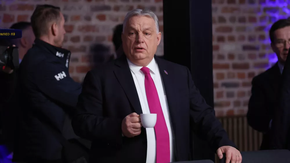 Hungary's Prime Minister Viktor Orban waits for the start of a round table meeting for the EU summit at Alden Biesen Castle in Bilzen-Hoeselt, Belgium, Thursday, Feb. 12, 2026. (AP Photo/Omar Havana)