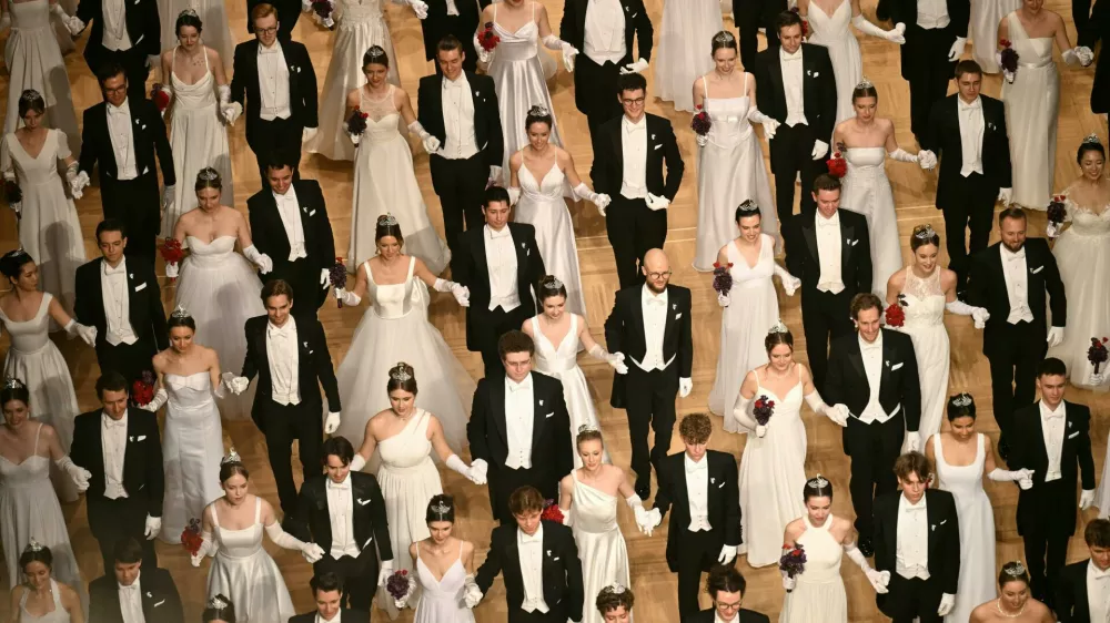 12 February 2026, Austria, Vienna: Debutante couples enter the hall during the opening of the 68th Vienna Opera Ball at the Vienna State Opera. Photo: Helmut Fohringer/APA/dpa