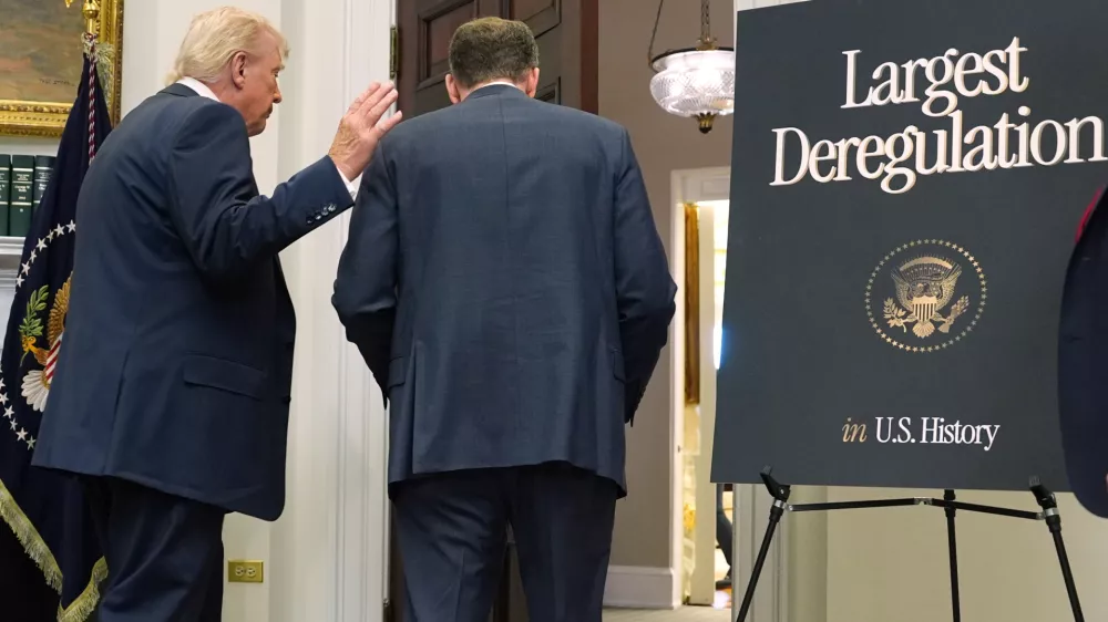 President Donald Trump departs with Environmental Protection Agency director Lee Zeldin and Office of Management after announcing the EPA will no longer regulate greenhouse gases, in the Roosevelt Room of the White House, Thursday, Feb. 12, 2026, in Washington. (AP Photo/Evan Vucci)