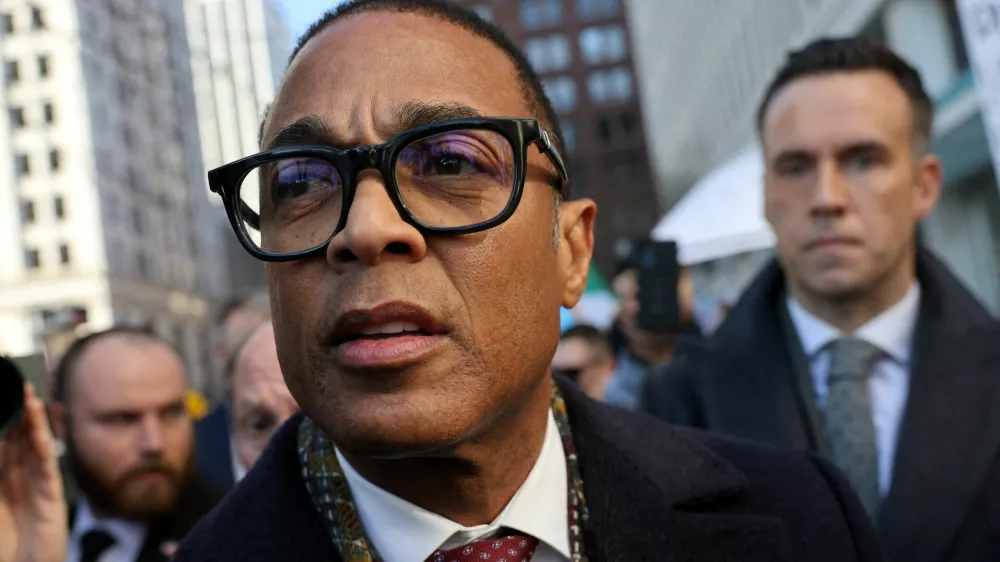 Former CNN anchor Don Lemon walks out of the United States District Court after his arraignment in Saint Paul, Minnesota, U.S. February 13, 2026. REUTERS/Go Nakamura   TPX IMAGES OF THE DAY